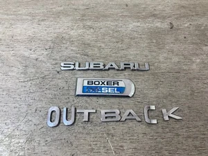 2008 SUBARU OUTBACK REAR BADGE LOGO EMBLEM LETTERS - Picture 1 of 3