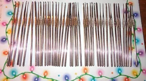LOTTO MISTO 46 UNCINETTI BOYE VINTAGE METALLO COLOR ARGENTO 12 MISURE DIVERSE - Foto 1 di 7