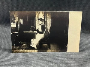 RPPC WOMAN POSED AT A SEWING MACHINE - Picture 1 of 2
