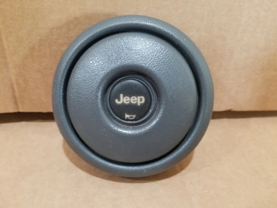 Tapa central bocina volante gris 80-95 Jeep CJ Wrangler YJ Foto 1 de 2