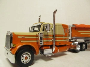 DCP 1/64 SCALE 379 PETERBILT FLAT TOP (McCORD) CON WILSON GRAIN TRAILER #33346 - Imagen 1 de 1