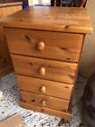 Two pine bedside cabinets