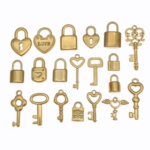 Ciondolo chiave lucchetto cuore acciaio inox oro fai da te creazione gioielli 10 pezzi - Foto 1 di 31