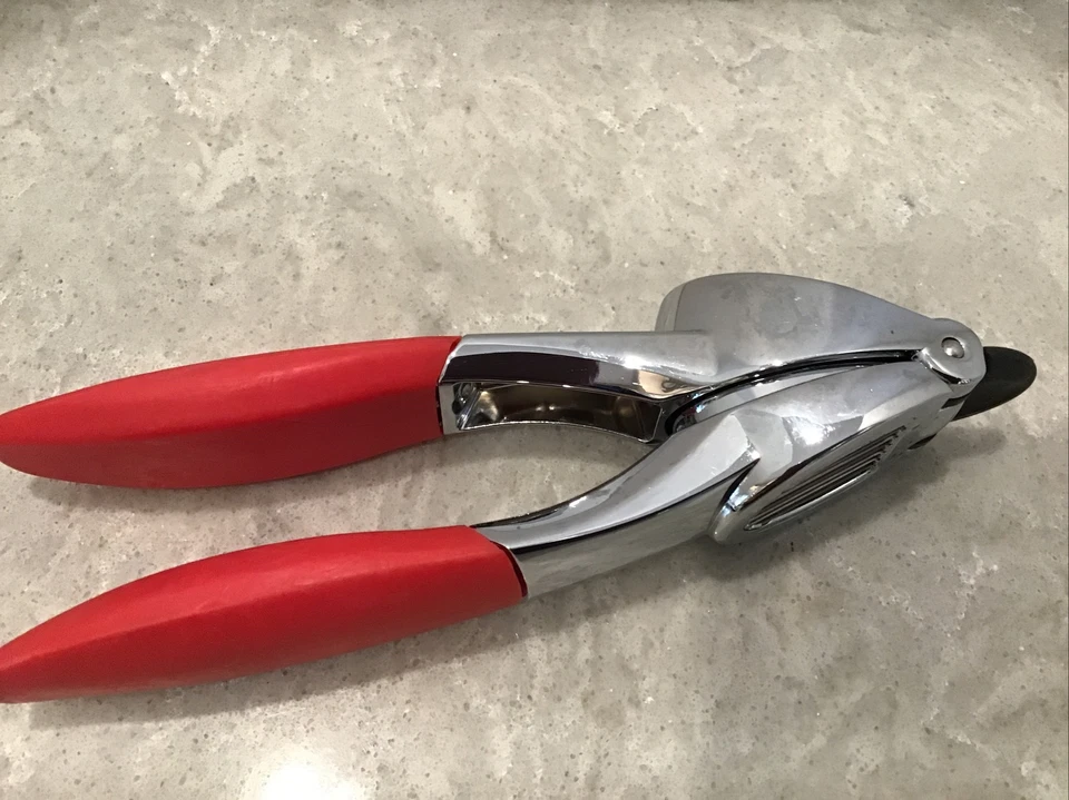 Trudeau Garlic Press, Red Preowned - Image 1 of 3