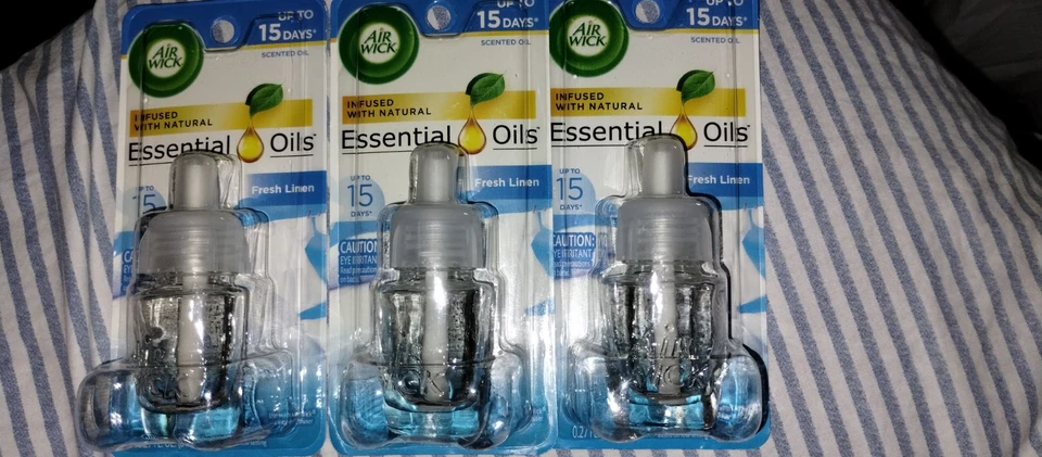 Juego de 3 Aceites Perfumados Esenciales Air Wick Lino Fresco Infundido Nuevo Lote Sellado .27 Foto 1 de 2