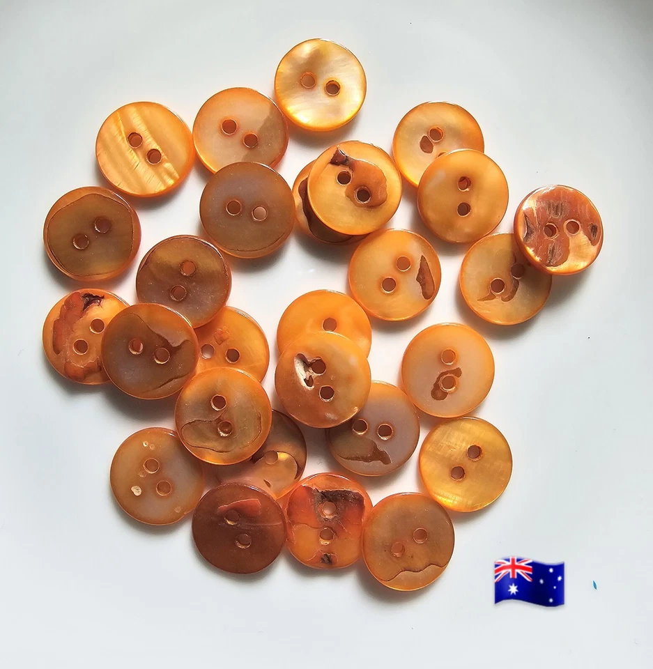 20pcs 15mm Orange Shell Round 2 Hole Buttons - Image 1 of 1