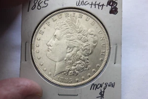 1885   FULL BREAST FEATHERS    UNC+++   MORGAN SILVER DOLLAR  SPOT ON HOLDER - Picture 1 of 2