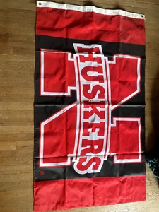Nebraska Cornhuskers Large Garden Flag - Black and Red with Nebraska N - Picture 1 of 5