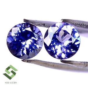 Par de piedras preciosas sueltas facetadas de 1,82 CTS corte redondo de tanzanita natural certificada de 7 mm - Imagen 1 de 7