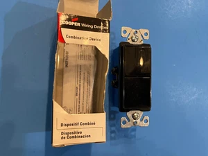 Cooper Wiring Devices 7728 BK- 15A 120/277V Black duplex  Decora - Picture 1 of 2