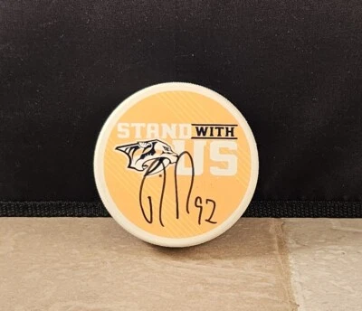 RYAN JOHANSEN #92 SIGNED AUTOGRAPH STAND WITH US HOCKEY PUCK NASHVILLE PREDATORS - Image 1 of 2