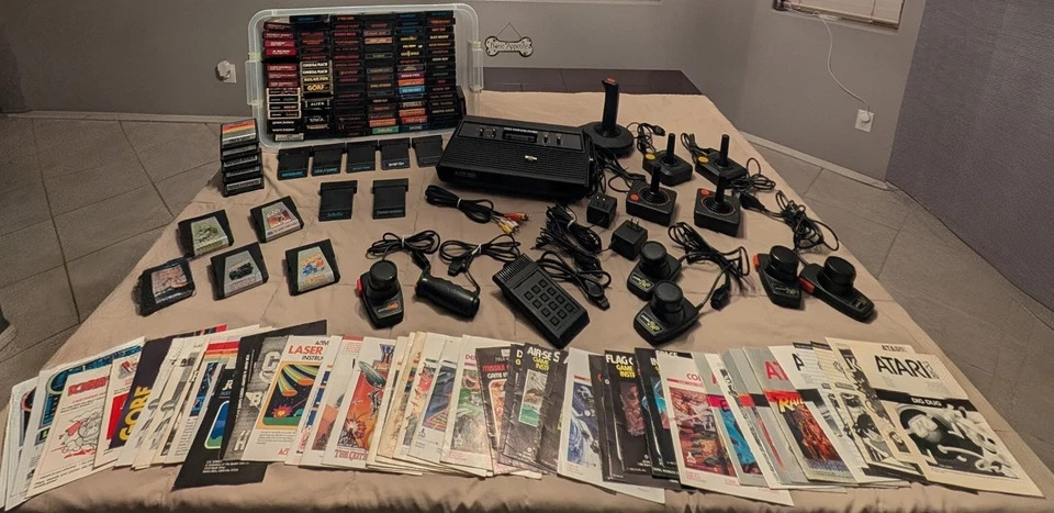 HUGE Atari 2600 Lot - 111 Games, 51 Manuals, & More!!! *CLEANED* & *WORKING*!!!  - Image 1 of 4
