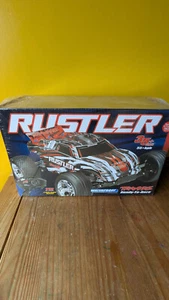 Traxxas Rustler new and sealed 370054-4 RED - Picture 1 of 8