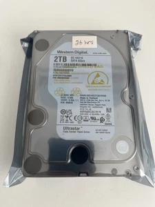 Western Digital PN : 1W10002 HGST HUS722T2TALA604 2 To SATA - 26 heures d'utilisation totale ! - Photo 1/2