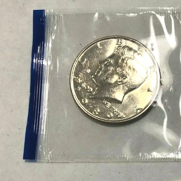 1989 P   Kennedy Half Dollar From Mint Sets In Mint Cello (1 coin ) - Image 1 of 1