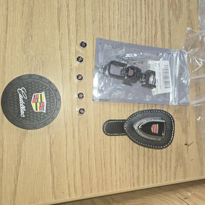 Cadillac Valve Stem Caps Coasters Keycain & Sunglasses Clip Nwot - Image 1 of 2