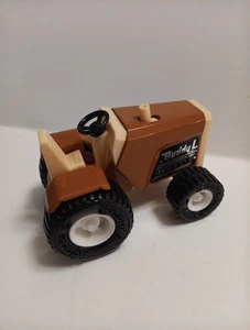 Vintage Buddy L 1978 Lil Brutes Mini Brown Tractor Pressed Steal Plastic Tires - Picture 1 of 5