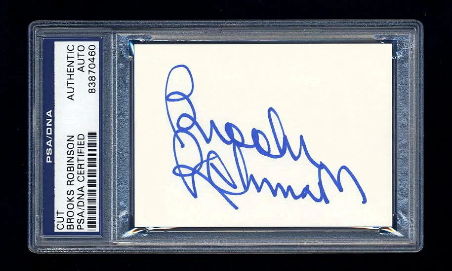 BROOKS ROBINSON SIGNED MINT CUT PSA/DNA SLABBED AUTOGRAPHED HOF ORIOLES MVP WSC - Image 1 of 1