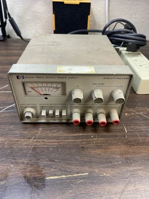Agilent HP 6235A 0 - 18V(+18 & -18), 0.2A / 0 - 6V, 1A Triple DC Power Supply - Image 1 of 4