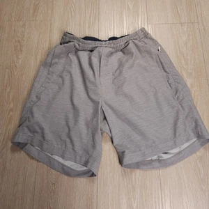 Pantaloncini sportivi foderati Birddogs uomo piccoli grigi performance 6" cuciture interne palestra - Foto 1 di 12