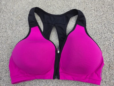 Sujetador deportivo acolchado con cremallera frontal Reebock talla M sin alambres rosa/negro Foto 1 de 4