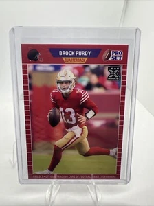 Juego Leaf Pro 2022 Fútbol 1989 Estilo Novato XRC Brock Purdy 49ers B66 - Imagen 1 de 2