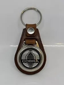 PORTACHIAVI COBRA ACCIAIO INOX MARRONE PELLE PREMIUM INCISO - Foto 1 di 2