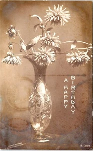 RPPC Cumpleaños Jarrón Flores Art Nouveau Rotógrafo Bromuro Foto Postal 1907 - Imagen 1 de 2