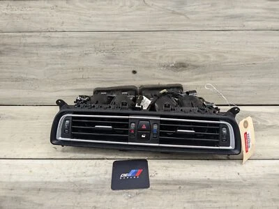 Решетка вентиляционная центральная для приборной панели 09–15 BMW F01 F02 740 750 760 ALPINA B7 черная от оригинального производителя - Изображение 1 из 4