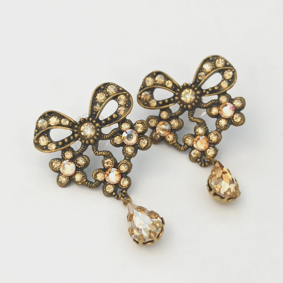 Pendientes con lazo Michal Negrin poste grande flores beige cristal cóctel declaración Foto 1 de 4