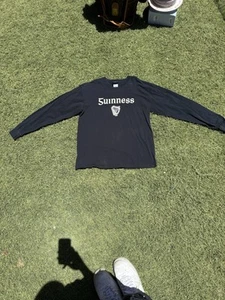 Guinness Gaelic Label offizielles schwarz-goldfarbenes Langarm-T-Shirt für Herren Größe XL - Bild 1 von 6