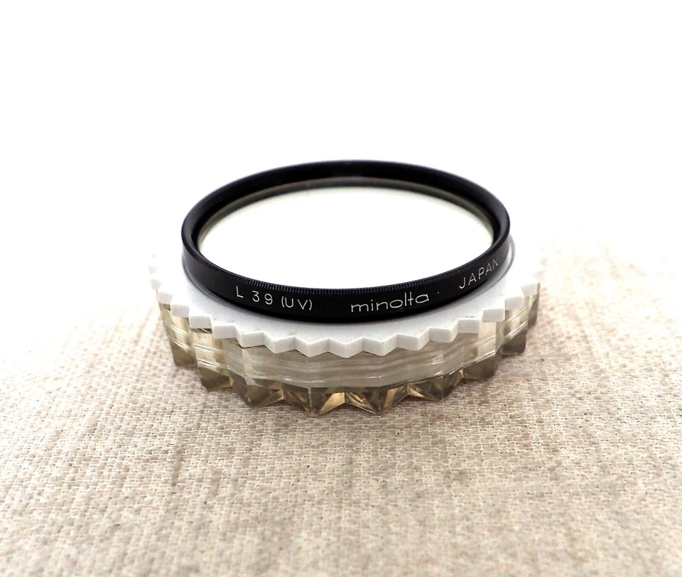 Vintage MINOLTA JAPAN 62mm UV Filter for camera lens SLR DSLR  - Image 1 of 1