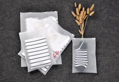 9 PCS PVC White Waterproof Clothes Storage Bags Packing Travel Luggage Organizer Foto 1 de 4