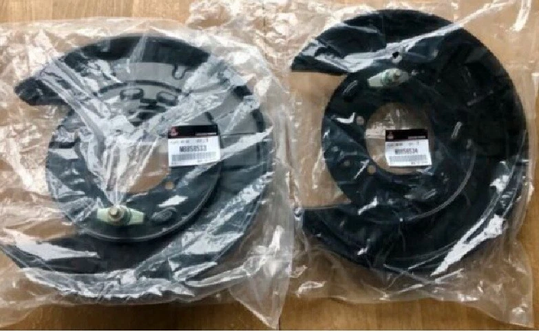 MITSUBISHI MONTERO SPORT K9#W 97-03 Rear Brake Backing Plate Genuine RH & LH Set - Image 1 of 1