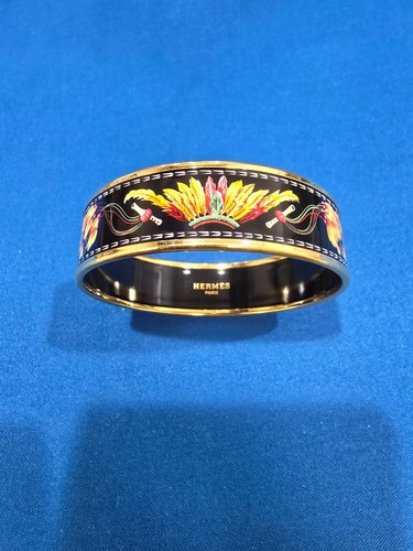 HERMÈS Bracciale largo Hermes Paris design copricapo piuma smalto tono oro