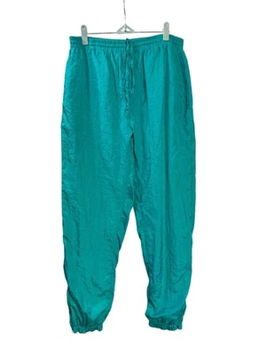 Pantalones de chándal cortavientos de nailon verde azulado Clipper Bay de colección M cintura elástica cordón Foto 1 de 4