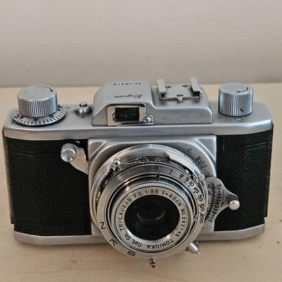 Cámara de 35 mm Pigeon de colección con lente/accesorios Tomioka, Japón (piezas - leer PLS) Foto 1 de 4