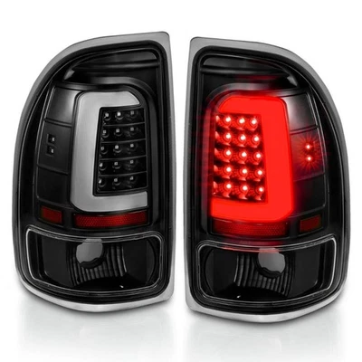 Par de luces traseras LED ANZO para Dodge Dakota 1997-2004 carcasa negra lentes transparentes Foto 1 de 4