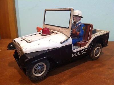 Vintage Battery Operated Tin Toy "Turn-O-Matic Gun" Willy's Police Jeep - Image 1 of 4