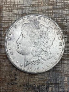 1899-O $1 US Morgan Silver Dollar - Picture 1 of 2