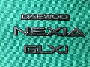 DAEWOO NEXIA GLXi  -  CAR BADGES /  EMBLEMS - Picture 1 of 2
