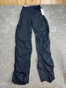 NEU Lululemon Tanzstudio schmale Passform hoch geschnitten Schlaghose Gr. X-Small - schwarz - Bild 1 von 8
