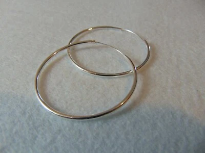 ORECHINI DONNA A CERCHIO IN ARGENTO RODIATO DIAMETRO 6 CM. - Immagine 1 di 4