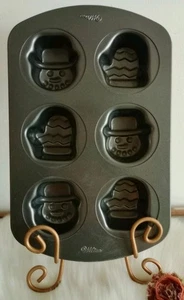 Wilton Navidad Cupcake Muffin Pan Muñeco de Nieve y Mitones Antiadherente 6 Cavidades Usado en Excelente Condición - Imagen 1 de 4