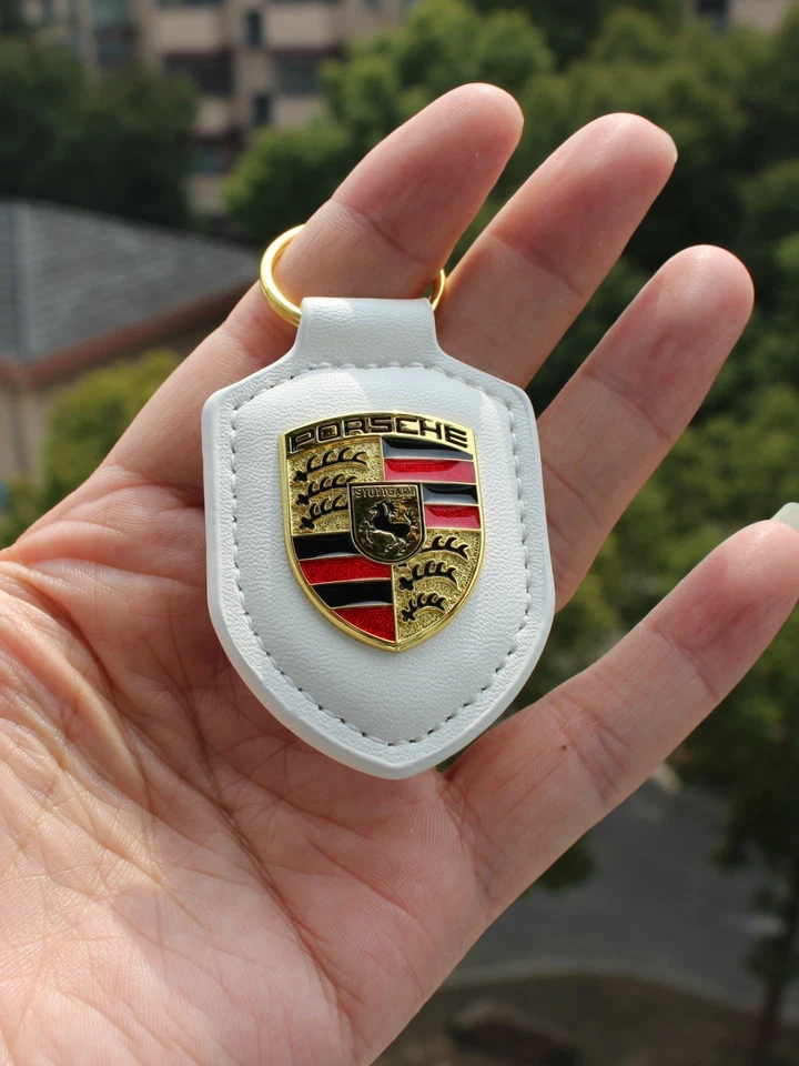 NUEVO EN STOCK EE. UU. Porsche Crest Sheild Llavero de cuero Envío gratuito Elige tu color Foto 1 de 1