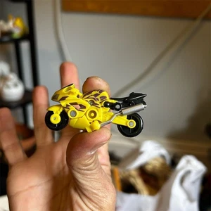 Transformers Mini-Con Dirt Rocket Actionfigur gelb Motorradmodus - Bild 1 von 7