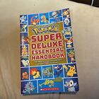 Pokemon  Super Deluxe Essential Handbook Paperback Book Scholastic W Stickers