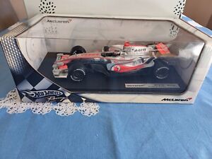 Hotwheels 1:18 Fernando Alonso MP4-22 caja sin abrir pero desmejorado