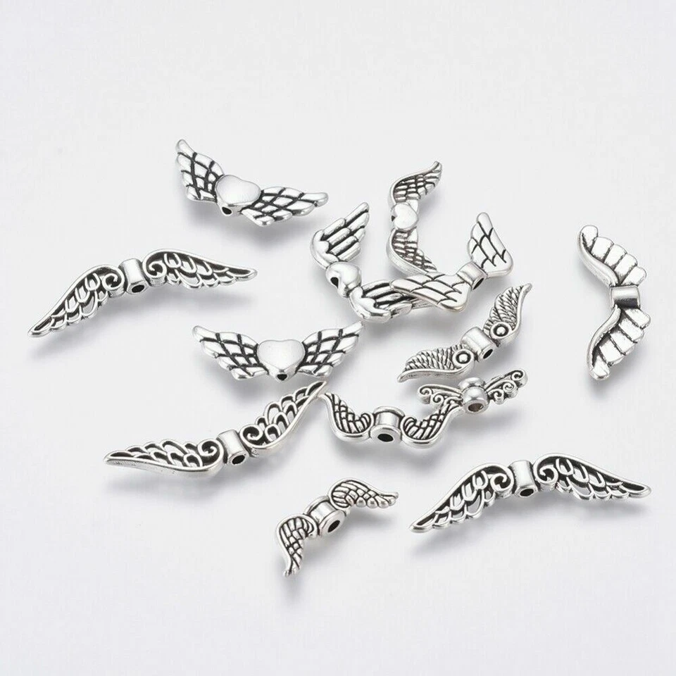 Mixed pack Tibetan silver angel butterfly wing spacer bead random different ones - Image 1 of 1