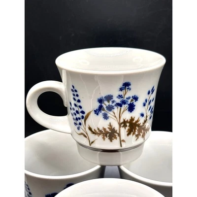 Juego de cuatro tazas Noritake Winsome de gres azul marrón diseño de flores silvestres vintage Foto 1 de 4